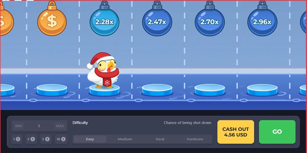Screenshot of a winter-themed Chicken Road-style game showing a small chicken in a Santa hat standing on icy platforms beneath hanging multiplier bombs (2.28x, 2.47x, 2.70x, 2.96x), with a bottom control bar for bet and difficulty settings plus “CASH OUT 4.56 USD” and a green “GO” button.